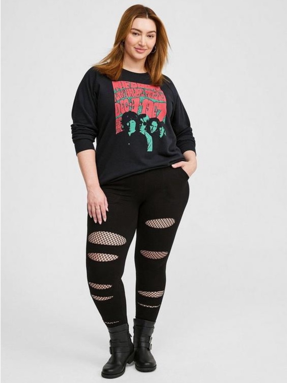 Torrid  fishnet cut bandage leggings